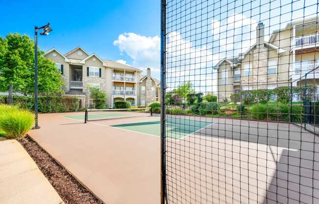 a tennis court at the reserve at riverdale apartments in riverdale, nj