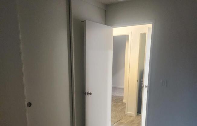 2x2D secondary room with closet and carpet