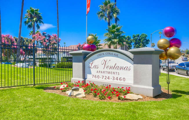 the sign at the entrance to the las vallarta apartments