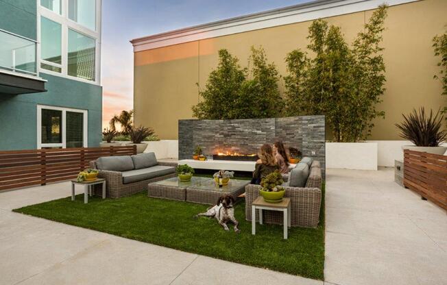 outdoor lounge area with fire pit