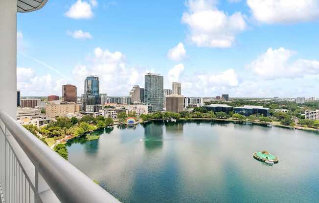 A cityscape with a body of water and a boat.