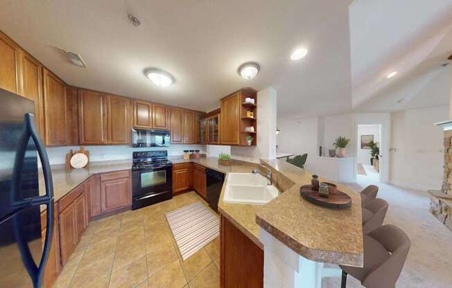 a kitchen with a sink and a counter top
