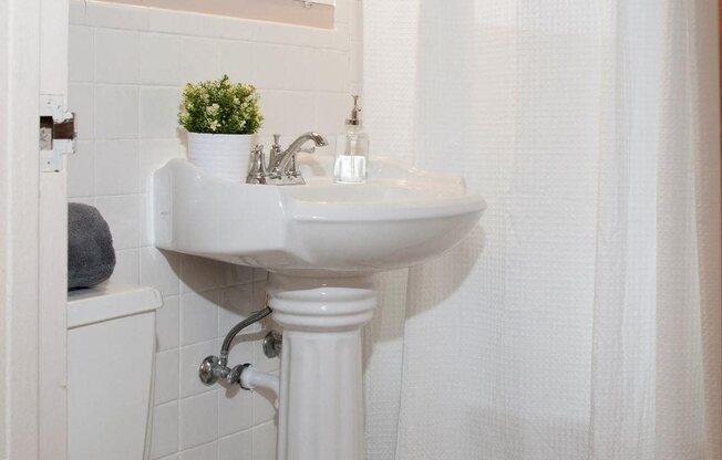 St. Louis Park Apartment Bathroom with Tile Floors and Shower with Bathtub