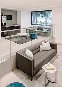 Clubhouse with couch at The Graham at Southern Towers, Alexandria, 22311