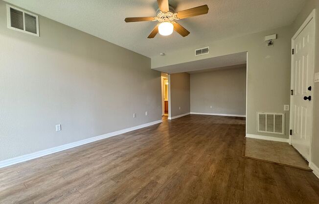 Lovely Winter Springs Condo ~ Vinyl Plank Flooring and Large Screened Patio!