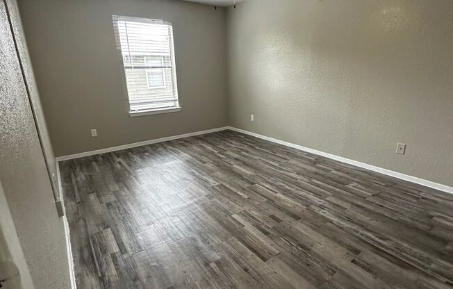 Spacious Two Bedroom Townhome with Private Patio!
