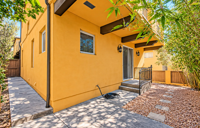 SPACIOUS & SECLUDED, SPANISH MEDITERRANEAN REAR UNIT TOWNHOUSE W/ LARGE ROOFTOP DECK W/ OCEAN/PV VIEWS, 2 BALCONIES, WRAP AROUND YARD & 2-CAR GARAGE ON CUL-DE-SAC STREET CLOSE TO SCHOOLS, SHOPPING, RB PIER & BEACH!