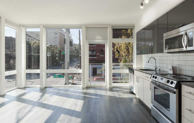 Kitchen with Stainless Steel Appliances and Hard Surface Flooring