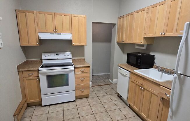 $500.00 Off First Months Rent! Updated & Inviting Highlands Condo – Live in the Heart of It All!!