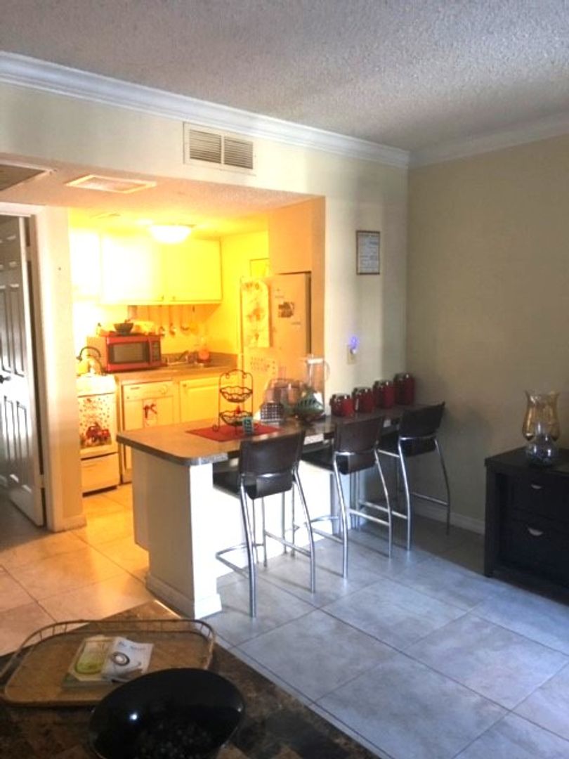 1 BR/1 BA Condo; Ground Floor Unit; All-Tile Flooring; Pool; Water/Sewer INCLUDED in the Rent!