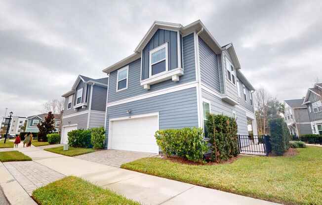 Single-family Courtyard Home nestled within David Weekley's exclusive enclave of Tidal Pointe!