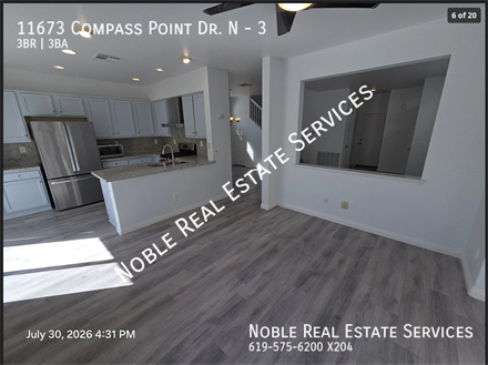 11673 COMPASS PT DR N
