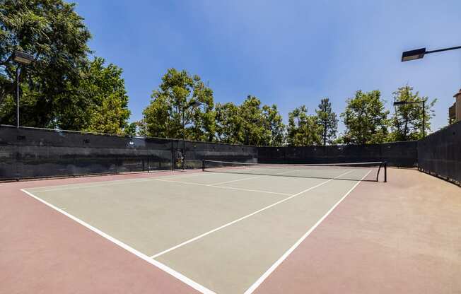 a tennis court on the property