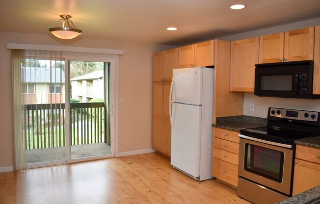 Remodeled 3BD Condo with granite counters and wood burning fireplace! Gated Community