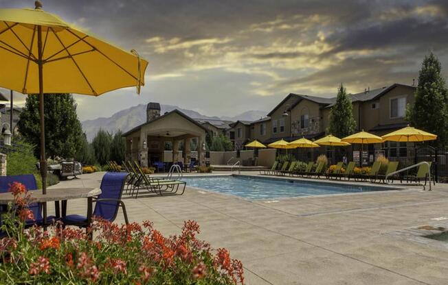 Resort Inspired Pool with Sundeck at Four Seasons Apartments & Townhomes, North Logan, UT