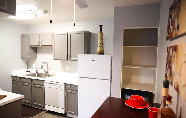 a kitchen with a table in a room