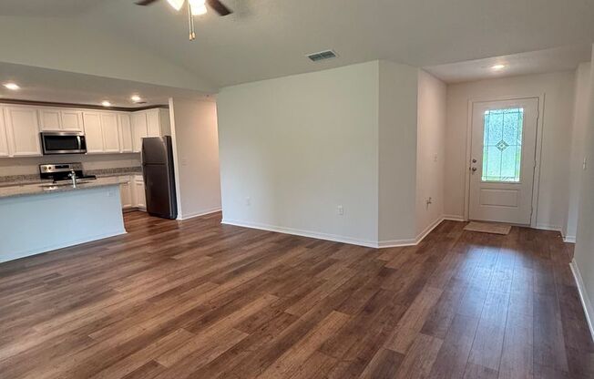 Stunning Brand-New 3 Bedroom + Den with Fenced in yard and screened in porch!