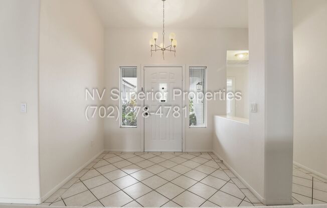 NW!! Single Story!!! 3 Car Garage!!  2 Masters!!! Low Maintenance desert landscape front yard!!  Covered Patio in back yard!! No Carpet!!!!