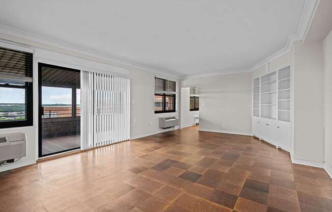 A large empty room with a checkered floor.