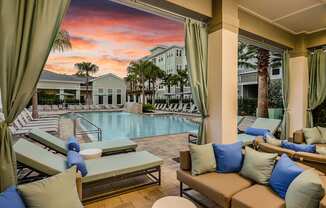 Lounge Seating by the Pool at Epic at Gateway Luxury Apartments in Pinellas County FL