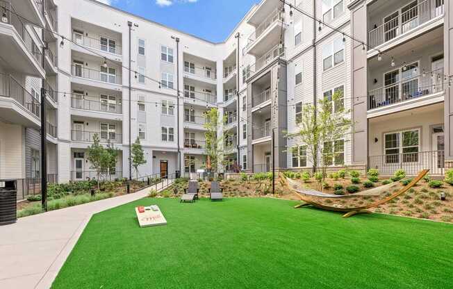 Alton Mill District Apartments in Charlotte, North Carolina Courtyard with Corn Hole