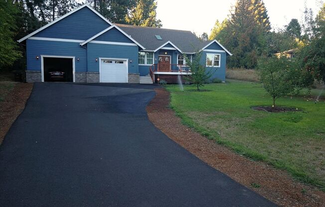 Custom Hillsboro Ranch with Gourmet Kitchen, Dual Fireplaces & Upgraded Finishes!