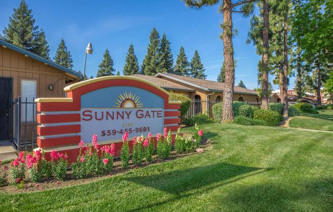 a sign in front of a house