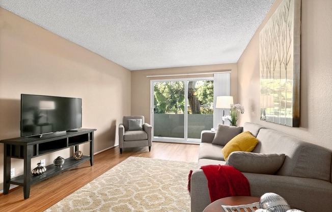 Mar Vista Apartments - Vista - Jones & Jones - Living Room with Wood-Style Flooring