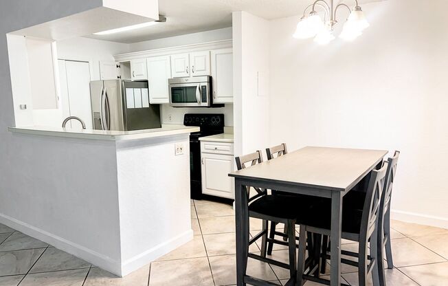 MOVE IN NOW!! Spacious 3 x2 on 2nd floor with screened in porch!! All tile floors!!