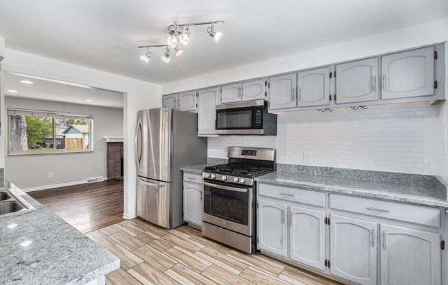 Updated Five-Bedroom Brick Ranch in the Heart of Littleton