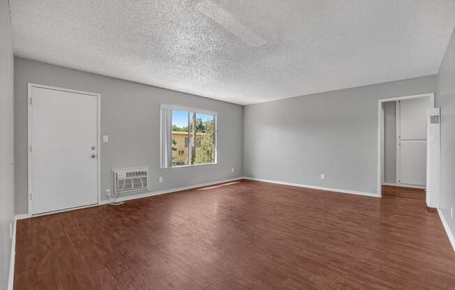 capistrano gardens unit 105 living room with view of front door