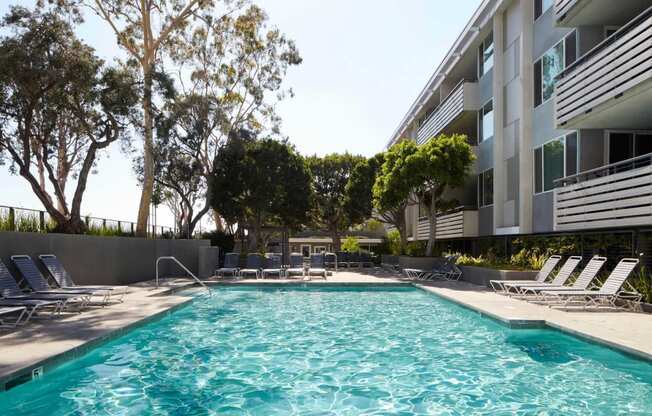 the swimming pool at an apartment community