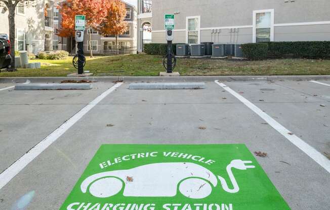 an electric vehicle charging station in a parking lot