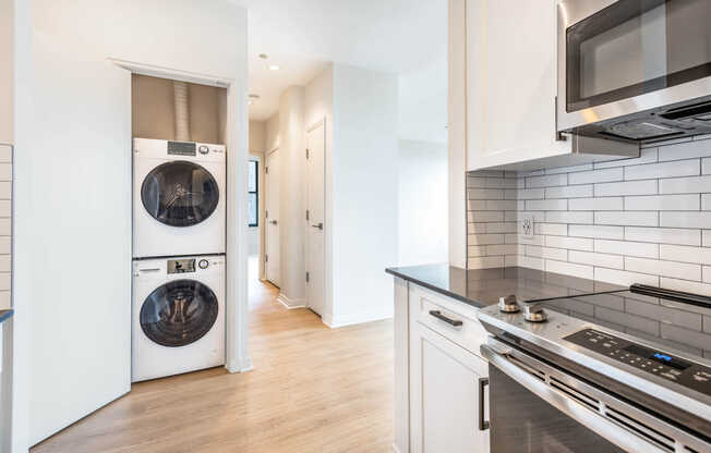 Kitchen with In-home Washer and Dryer