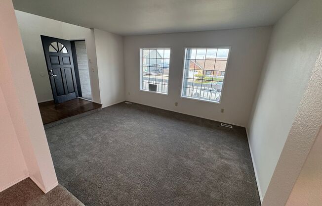 Bright NE Tacoma Home 3 Bedroom 2 Bath, Peaking Sound View with a 3 Car Garage & Fenced Yard!