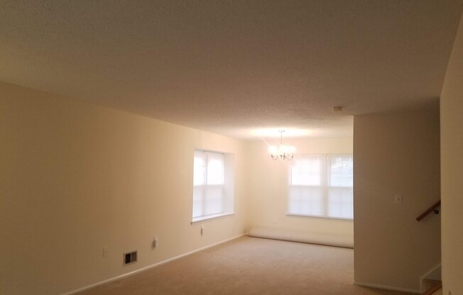 Updated, spacious, centrally located end-unit townhouse with lots of amenities in exclusive Governor's Pointe!