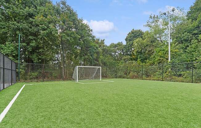 Community Soccer Field with Nets at Heights at Marlborough Apartments located in Marlborough, MA.