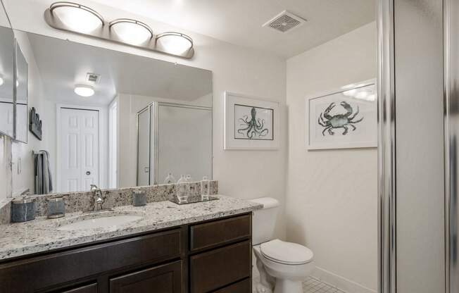 Master Adjoining Bath with Glass Shower at Lakeside Village Apartments Clinton Township MI