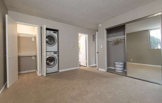A laundry room with a washer and dryer.