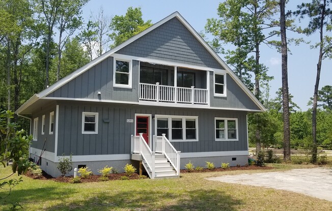 5 bedroom / 4 bath home with a short drive to the beach!