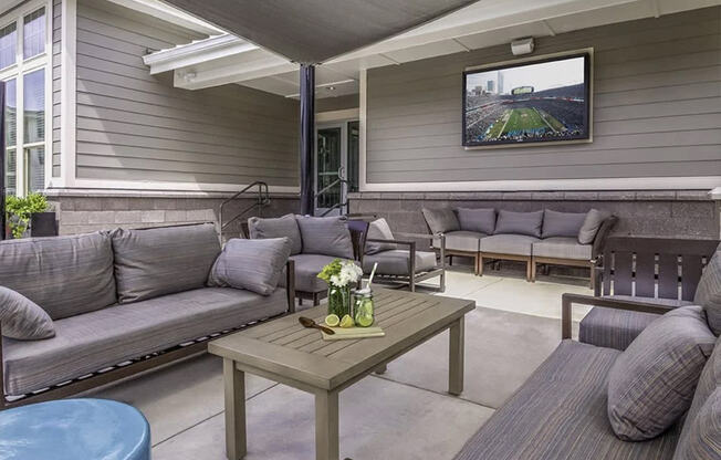 Outdoor lounge with TV at Sycamore at Tyvola, Charlotte, 28217