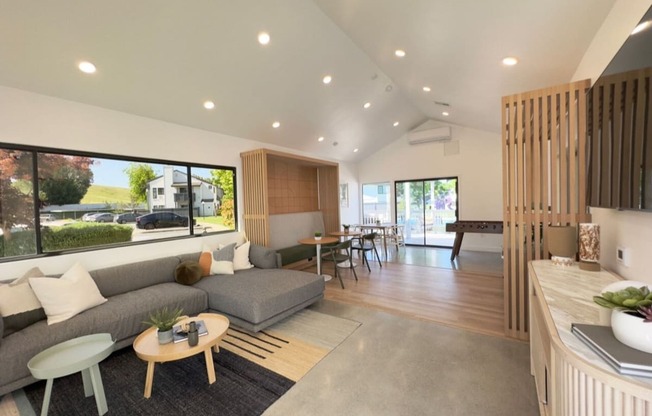a rendering of a living room with a couch and a table