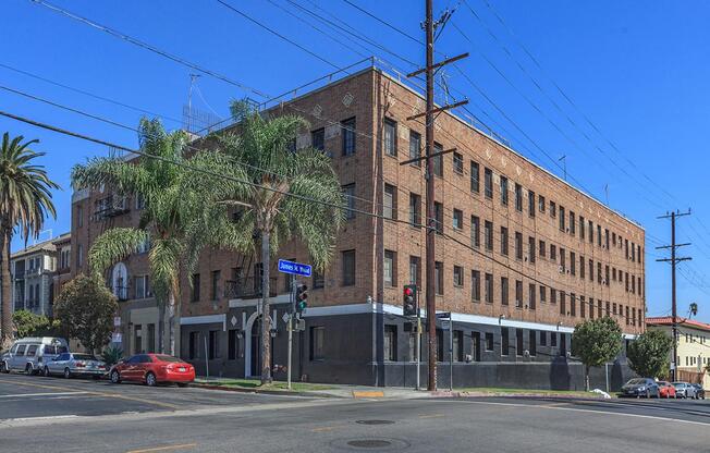 a building with a store on the corner of a street