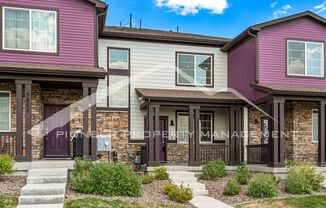 Townhome in NE Aurora with Central AC and 2 Car Garage!