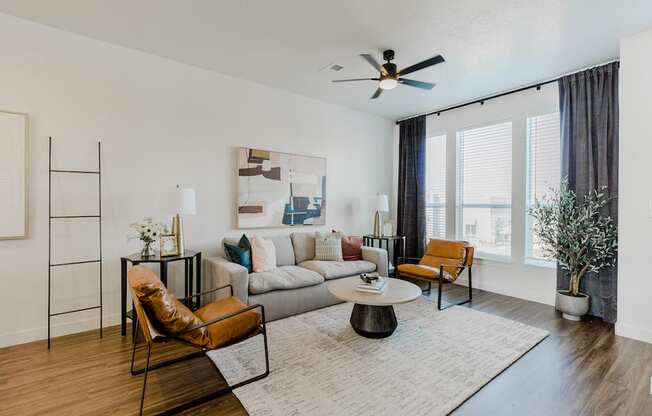 Spacious Living with Woodgrain Flooring at Parc at Day Dairy Apartments and Townhomes, Draper