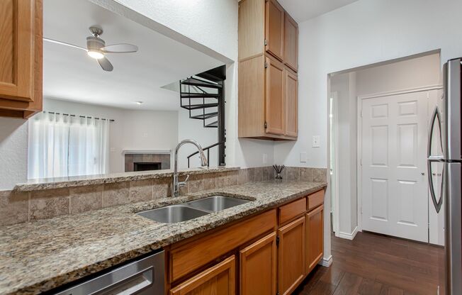 2-Story Junius Heights Condo With Updates