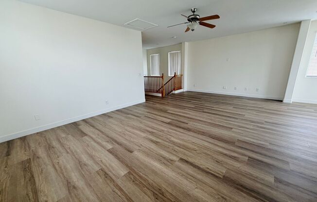 4 bed 2.5 bath home in the southwest with 3 bedrooms downstairs and the master bedroom upstairs! New LVP flooring installed throughout the house!