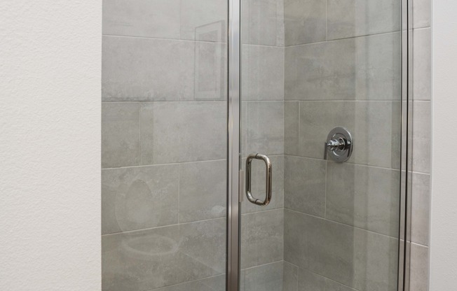 Showers with floor-to-ceiling tile surrounds