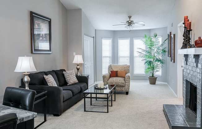 Large Windows in Carpeted Living Room