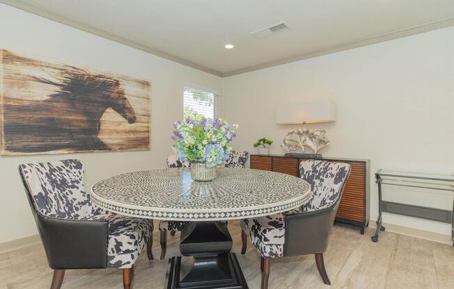 a living room filled with furniture and a rug